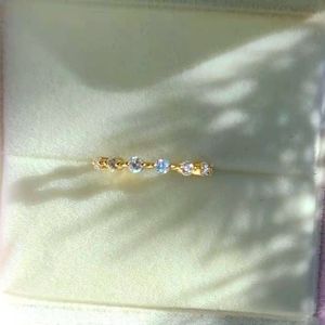 Solid 14k gold moissanite band